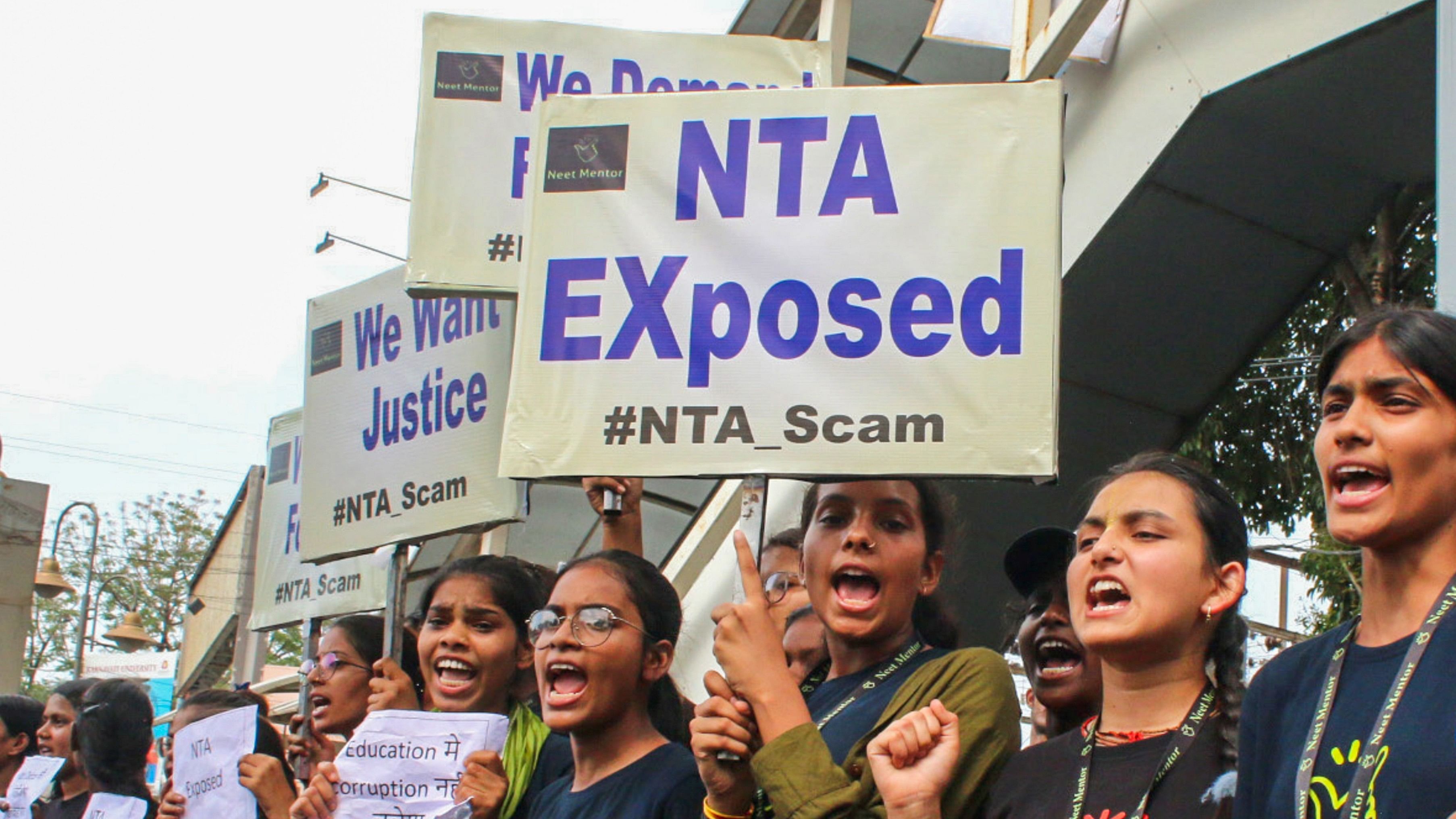 <div class="paragraphs"><p>Students raise slogans during a protest over the alleged irregularities in NEET 2024 results, in Bhopal, Friday, June 14, 2024.</p></div>