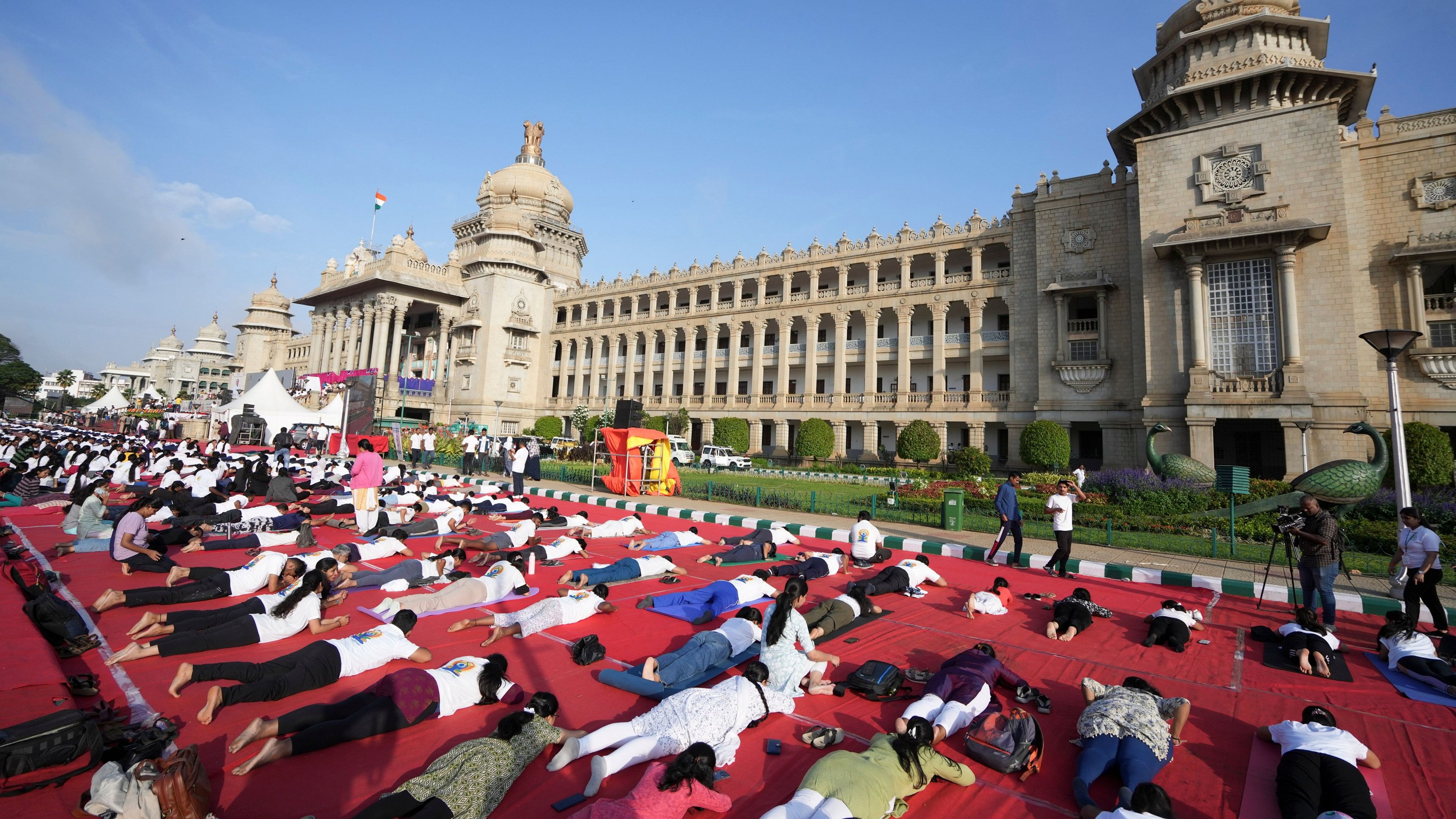 <div class="paragraphs"><p>People perform yoga on the 10th International Day of Yoga, at Vidhana Soudha, in Bengaluru.</p></div>