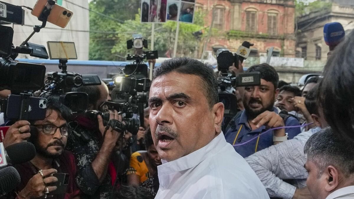 <div class="paragraphs"><p>BJP leader Suvendu Adhikari after police prevented him from entering Raj Bhavan to meet West Bengal Governor C V Ananda Bose with alleged victims of post-poll violence, in Kolkata.</p></div>