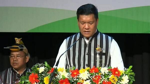 <div class="paragraphs"><p>Arunachal Pradesh Chief Minister-designate Pema Khandu takes oath for the third consecutive term at the DK State Convention Centre in Itanagar on Thursday, June 13, 2024.</p></div>