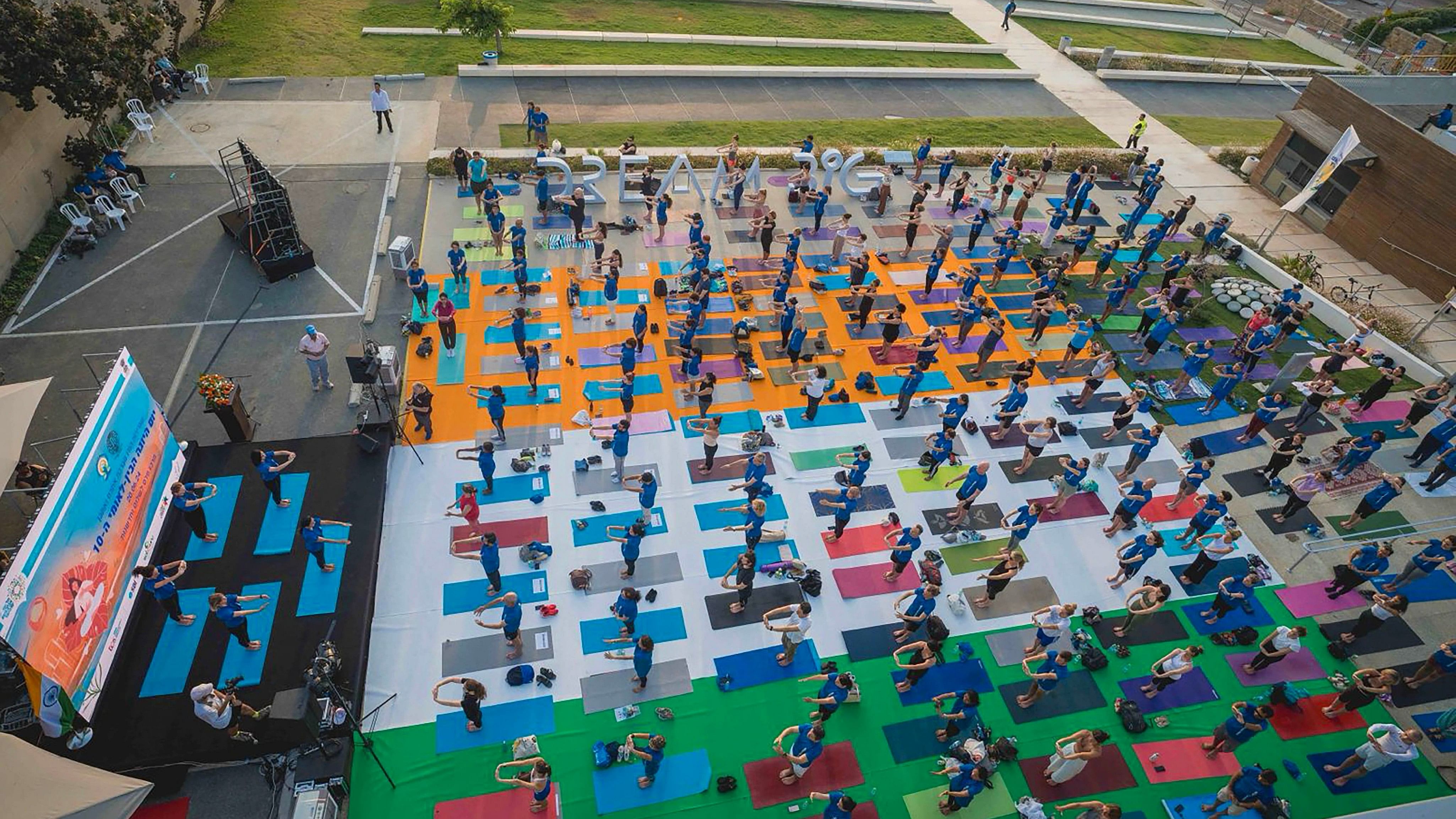 <div class="paragraphs"><p>People perform yoga at a programme organised to celebrate the 10th International Day of Yoga, in Tel Aviv, Israel on Thursday, June 20, 2024. </p></div>