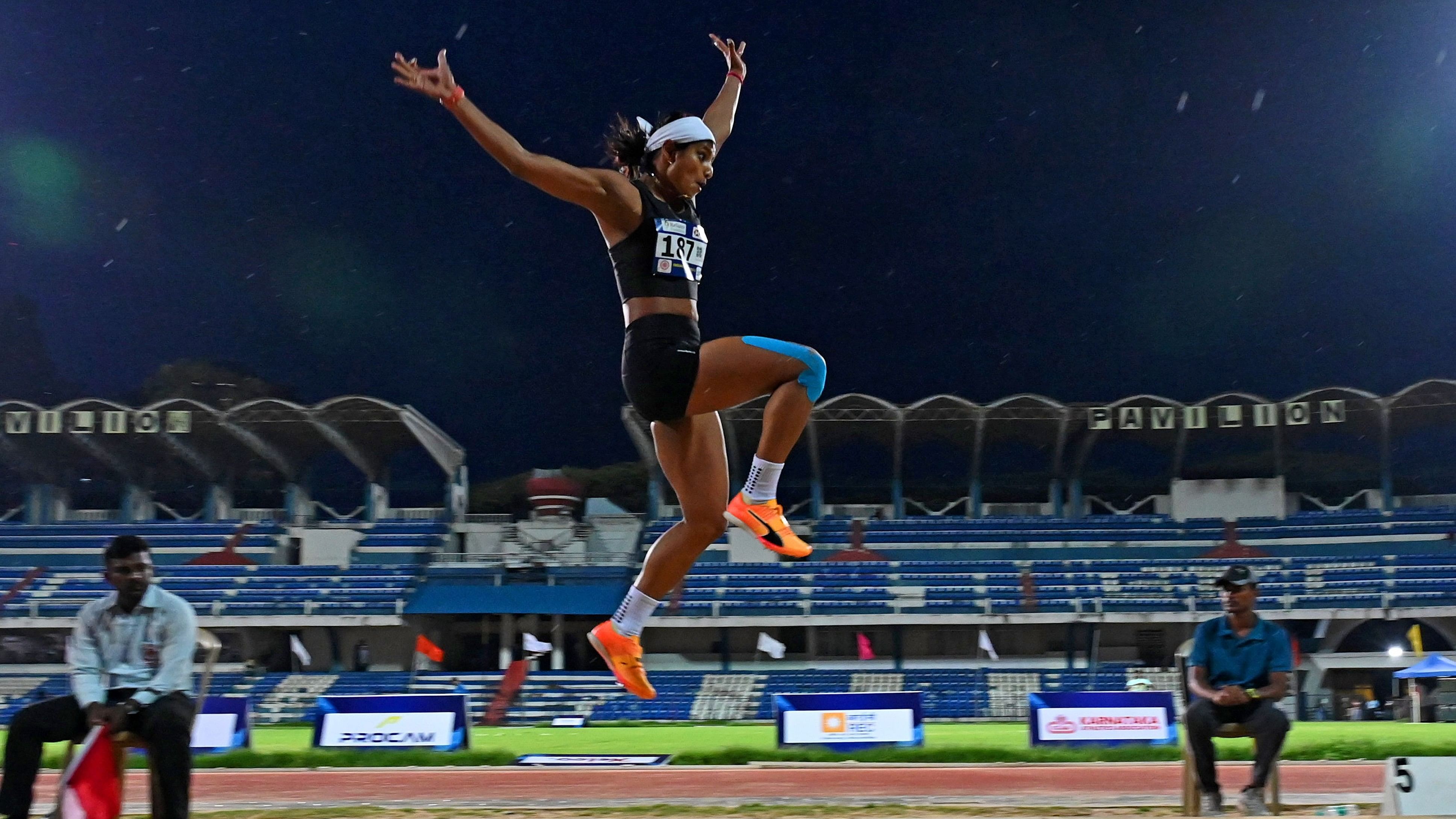 <div class="paragraphs"><p>Ancy Sojan E of Kerala in action during women's long jump competition at the Indian Grand Prix - 3 at the Sree Kanteerava Stadium in Bengaluru on Wednesday. </p></div>