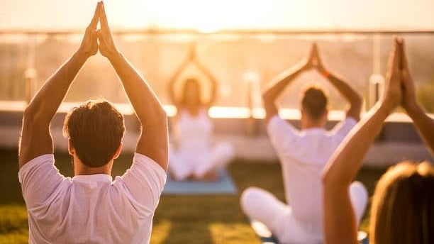 <div class="paragraphs"><p>Representative image of people performing yoga.</p></div>