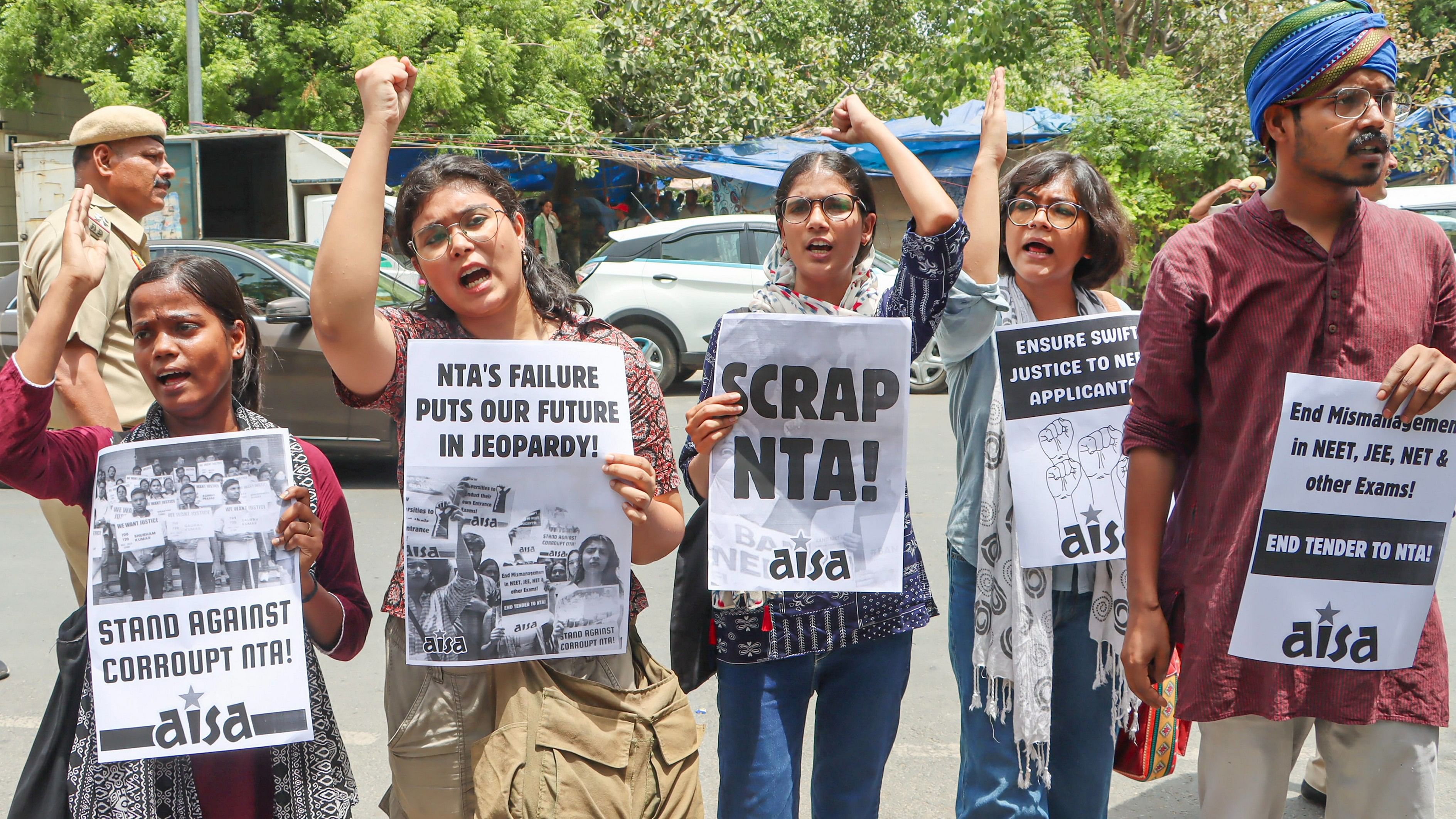 <div class="paragraphs"><p>Members of the All India Students Association (AISA) protest over the alleged irregularities in medical entrance exam NEET.</p></div>