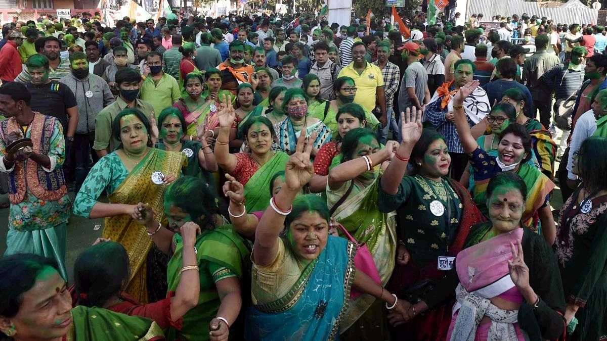 <div class="paragraphs"><p>Trinamool Congress supporters celebrate after the party's win  in Kolkata.</p></div>