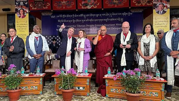 <div class="paragraphs"><p>Former US House speaker Nancy Pelosi along with Michael McCaul, the US Republican chair of the House Foreign Affairs Committee, takes part during a function at the Dalai LamaÕs temple after meeting with him in Dharamshala.<br></p></div>