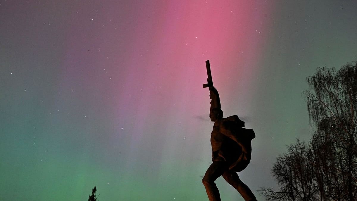 <div class="paragraphs"><p>The aurora borealis, also known as the 'northern lights’, caused by a coronal mass ejection on the Sun, illuminate the skies over the WWII monument in the southwestern Siberian town of Tara, Omsk region, Russia.</p></div>