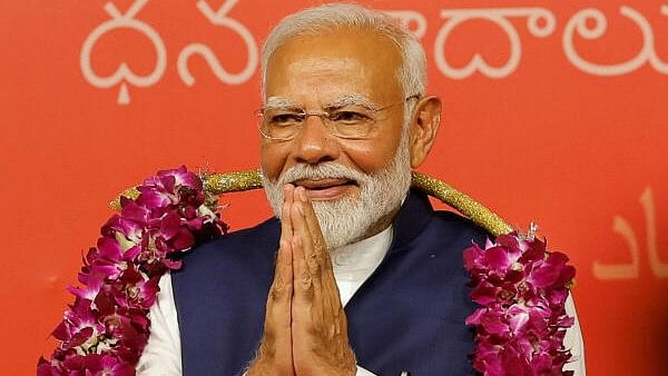 <div class="paragraphs"><p>Indian Prime Minister Narendra Modi gestures, at the Bharatiya Janata Party (BJP) headquarters in New Delhi.</p></div>