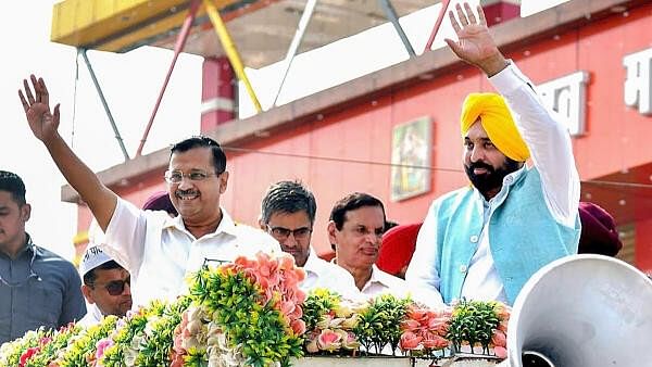 <div class="paragraphs"><p>Arvind Kejriwal and Bhagwant Mann seen during an election rally</p></div>