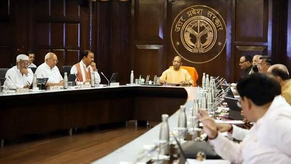 <div class="paragraphs"><p>Uttar Pradesh Chief Minister Yogi Adityanath with his deputies Keshav Prasad Maurya and Brajesh Pathak during a state cabinet meeting, in Lucknow, Tuesday, June 25, 2024</p></div>