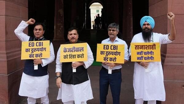 <div class="paragraphs"><p>AAP MP Sanjay Singh with party MPs protest demanding release of Delhi Chief Minister Arvind Kejriwal and against the alleged misuse of CBI and ED.</p></div>