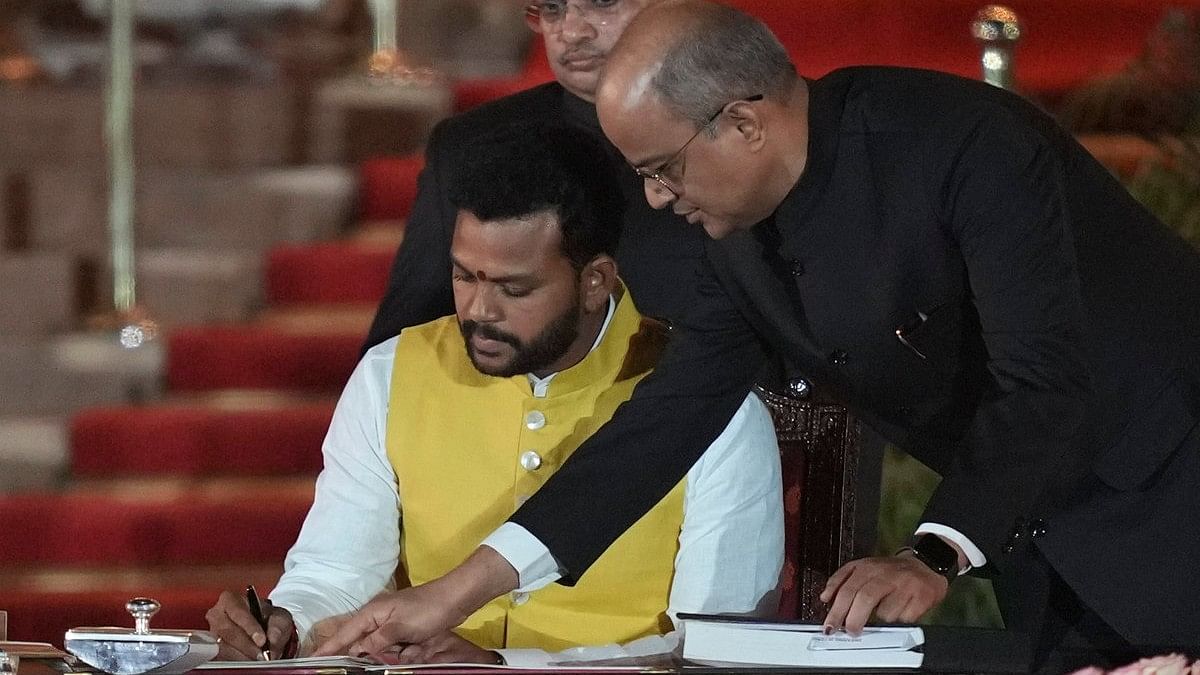 <div class="paragraphs"><p>TDP leader Kinjarapu Ram Mohan Naidu takes oath as minister at the swearing-in ceremony of new Union government, at Rashtrapati Bhavan in New Delhi.</p></div>