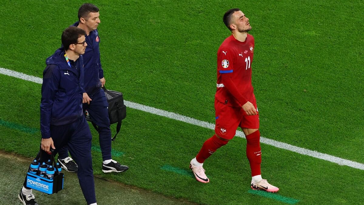 <div class="paragraphs"><p>Serbia's Filip Kostic walks off the pitch after being substituted.</p></div>