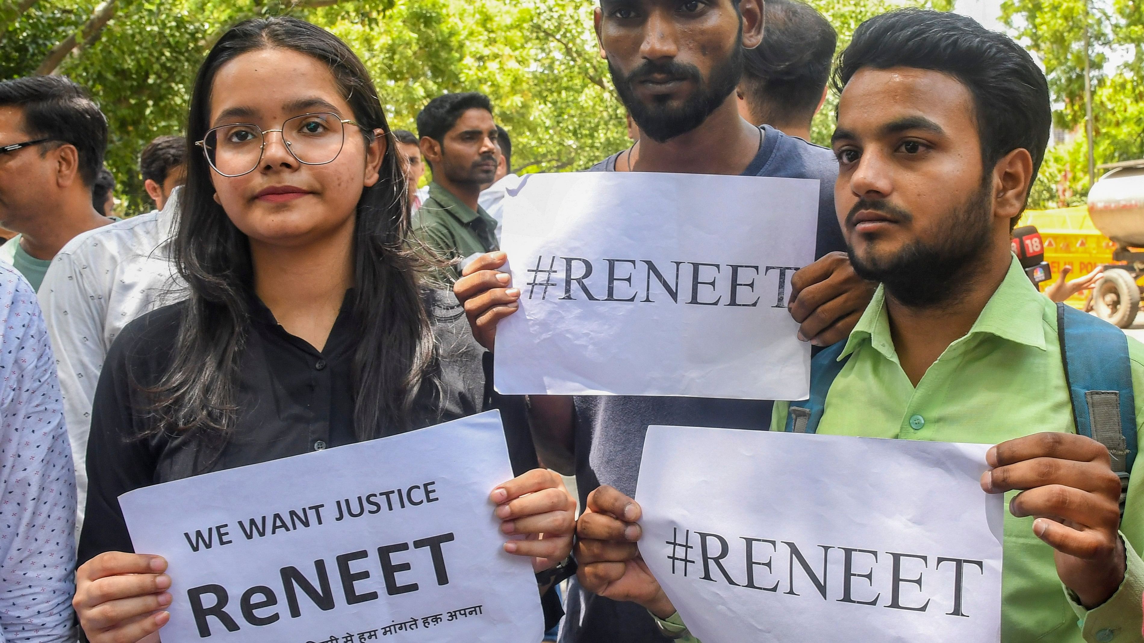 <div class="paragraphs"><p>NSUI members stage a protest demanding re-examination of NEET-UG Entrance Exam 2024 over alleged irregularities in its results.</p></div>