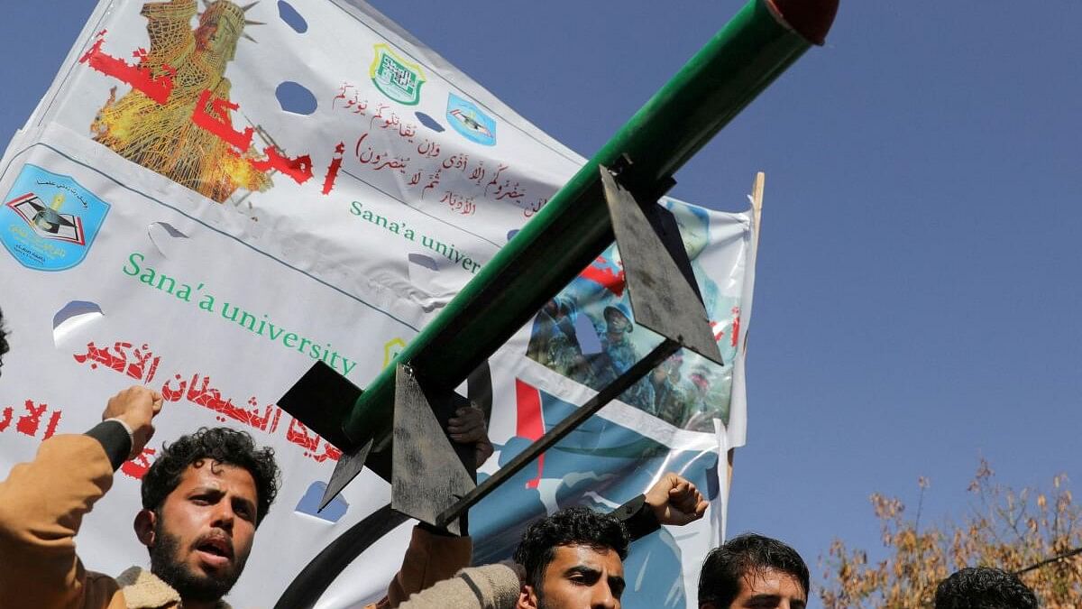 <div class="paragraphs"><p>Mock missile is carried by university students during a rally to show support for the Palestinians in the Gaza Strip and the recent Houthi strikes on ships in the Red Sea.</p></div>