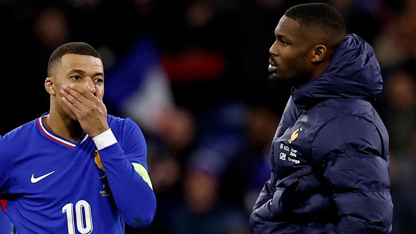 <div class="paragraphs"><p>France's Kylian Mbappe (left) and Marcus Thuram  after a match.</p></div>