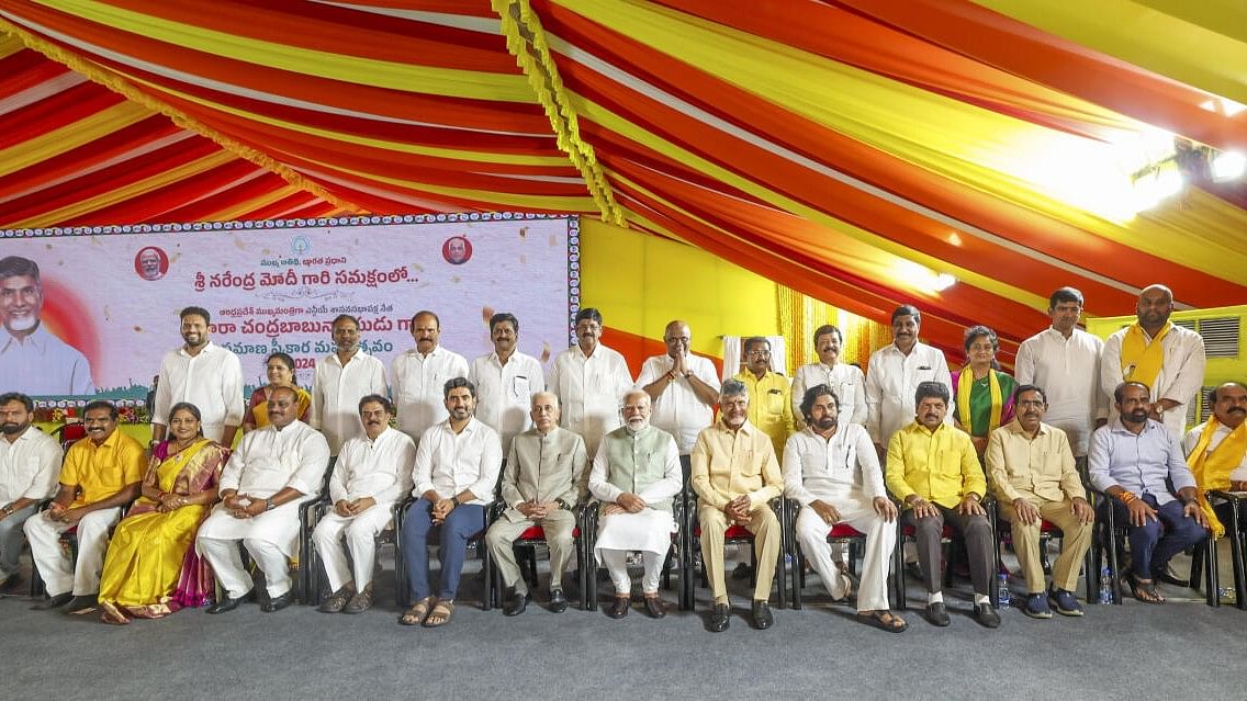 <div class="paragraphs"><p> Prime Minister Narendra Modi with Andhra Pradesh Governor S Abdul Nazeer, TDP supremo and newly sworn Andhra Pradesh Chief Minister N Chandrababu Naidu, state ministers Pawan Kalyan, Nara Lokesh and others during the ceremony, in Amaravati, Wednesday.</p></div>
