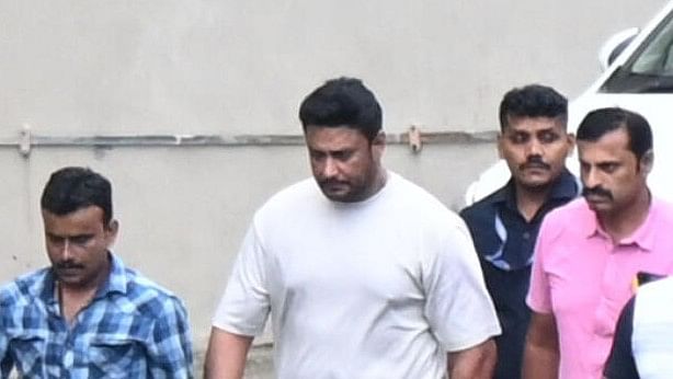 <div class="paragraphs"><p>Actor Darshan Thoogudeepa arriving for medical checkup after arrest in connection with a murder case, at Bowring hospital in Bengaluru on Tuesday. </p></div>