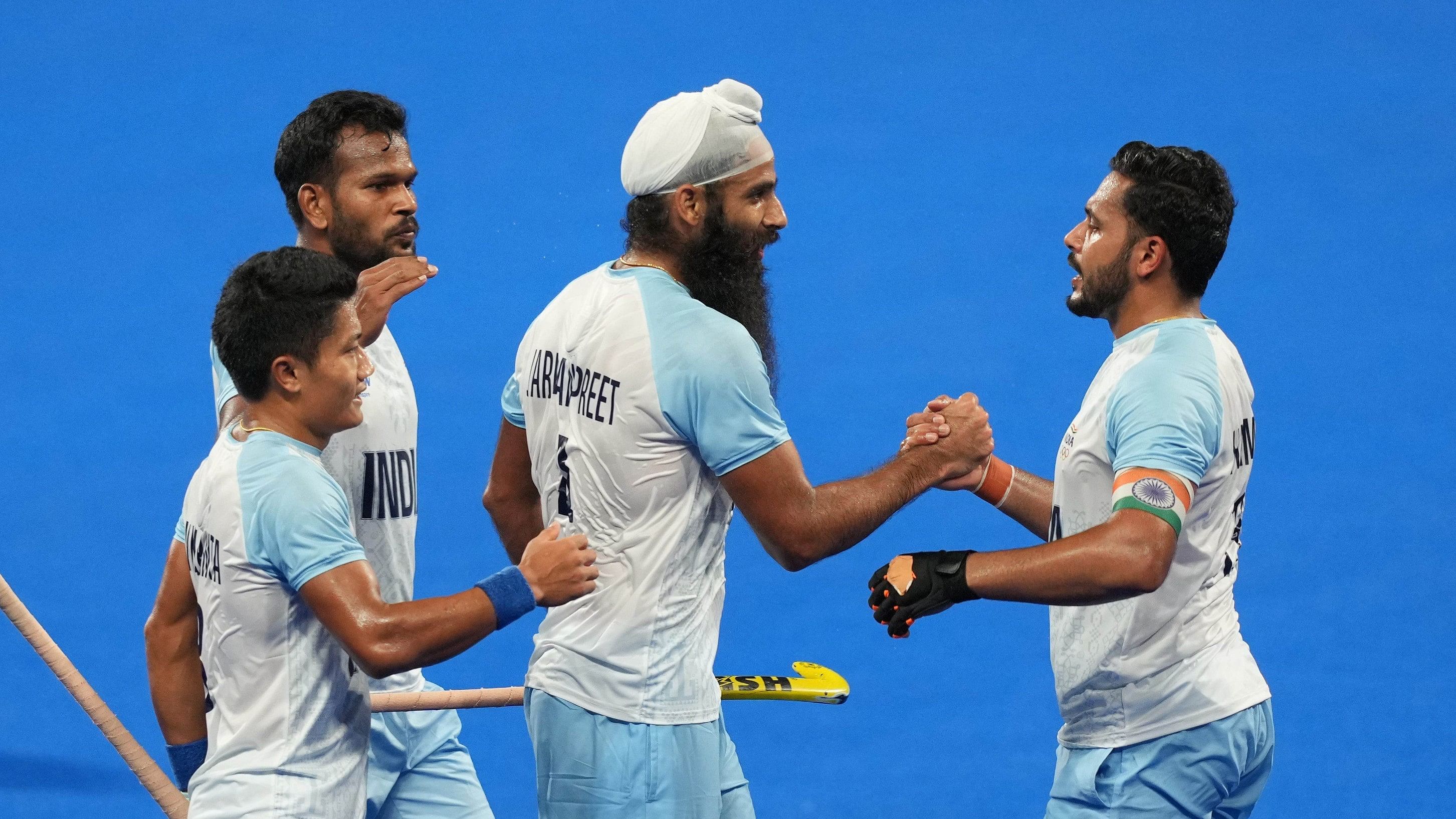 <div class="paragraphs"><p>India's hockey team captain Harmanpreet Singh, Jarmanpreet Singh, Amit Rohidas and Nilakanta Sharma celebrate after winning the Men's Hockey Final match against Japan at the 19th Asian Games in Hangzhou, China, in 2023.</p><p>Harmanpreet Singh has been named captain of the Indian national men's hockey team for the upcoming Paris Olympics.</p></div>