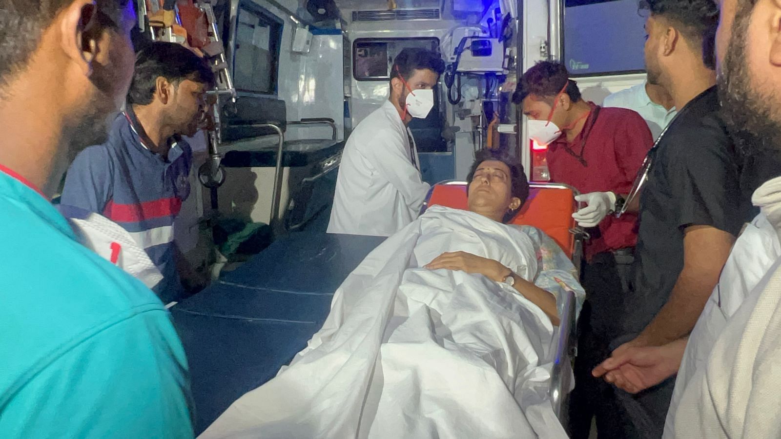 <div class="paragraphs"><p>Delhi Water Minister Atishi being stretchered off.</p></div>