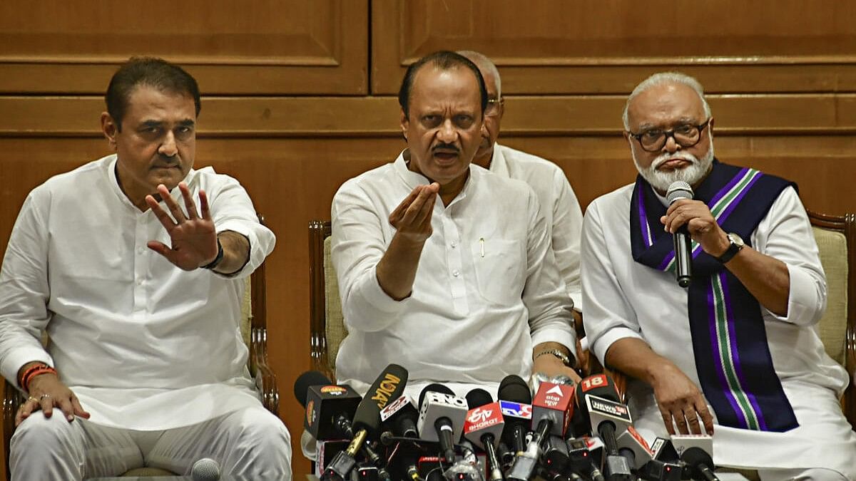 <div class="paragraphs"><p>Maharashtra Deputy Chief Minister Ajit Pawar with Nationalist Congress Party (NCP) leaders Chhagan Bhujbal and Praful Patel.</p></div>