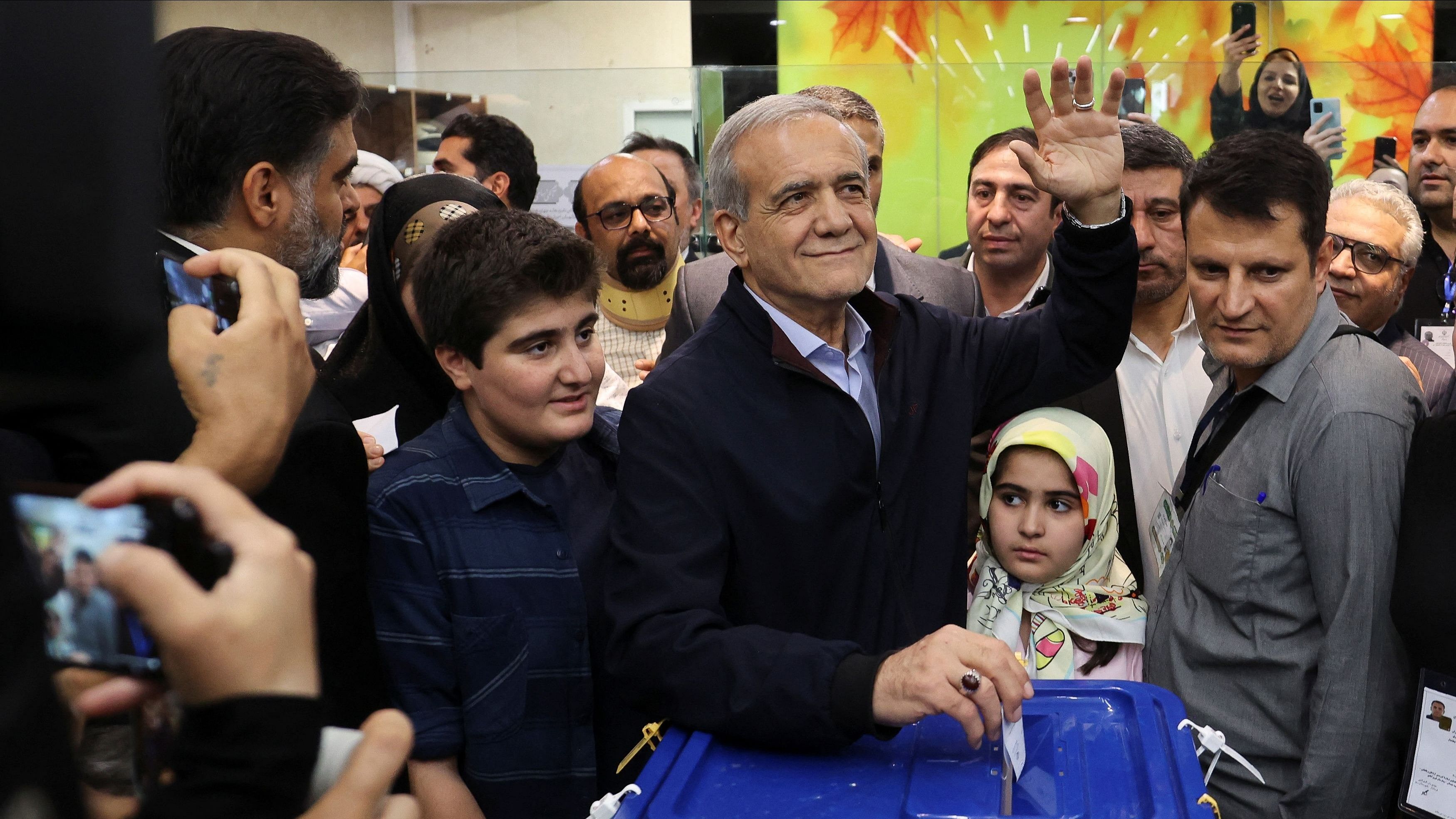 <div class="paragraphs"><p>Presidential candidate Masoud Pezeshkian votes at a polling station in a snap presidential election to choose a successor to Ebrahim Raisi following his death, June 28, 2024.</p></div>