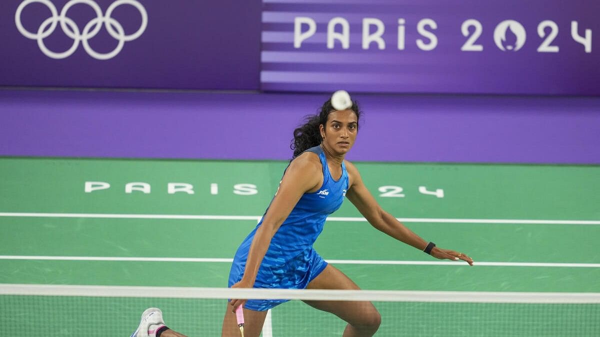 <div class="paragraphs"><p>PV Sindhu during her women's singles group play stage badminton match against Estonia's Kristin Kuuba at the 2024 Summer Olympics, in Paris, France, Wednesday, July 31, 2024.</p></div>