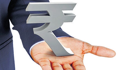 A highly volatile dollar overseas along with uncertainties surrounding US President Donald Trump's fiscal policy helped the rupee close higher too. File Photo