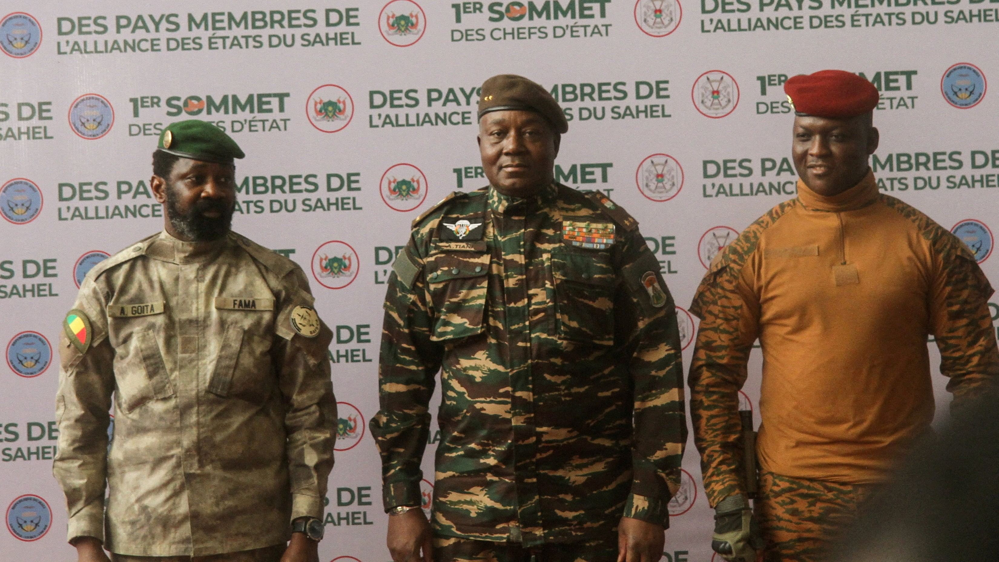 <div class="paragraphs"><p>eads of state Mali's Assimi Goita, Niger's General Abdourahamane Tiani and Burkina Faso's Captain Ibrahim Traore pose for photographs</p></div>