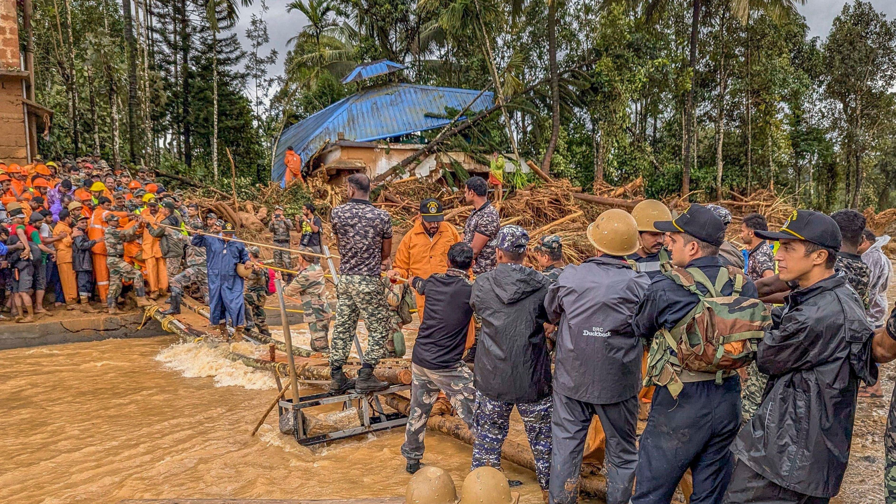 <div class="paragraphs"><p> Army personnel carry out rescue operation on the second day following landslides triggered by heavy rain at Chooralmala, in Wayanad district, Wednesday, July 31, 2024. </p></div>