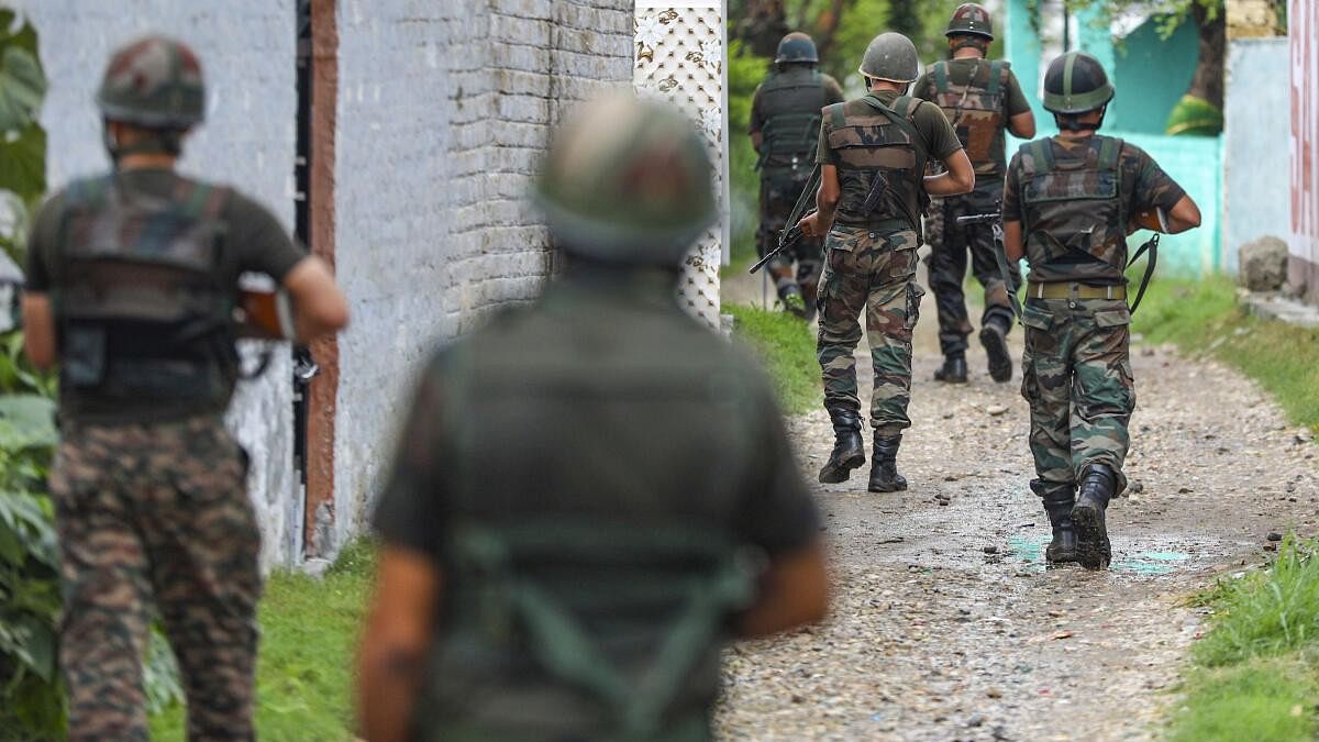 <div class="paragraphs"><p>Security personnel conduct a search operation following reports of suspicious movement of three people during the intervening night of Thursday&nbsp;in Jammu.</p></div>