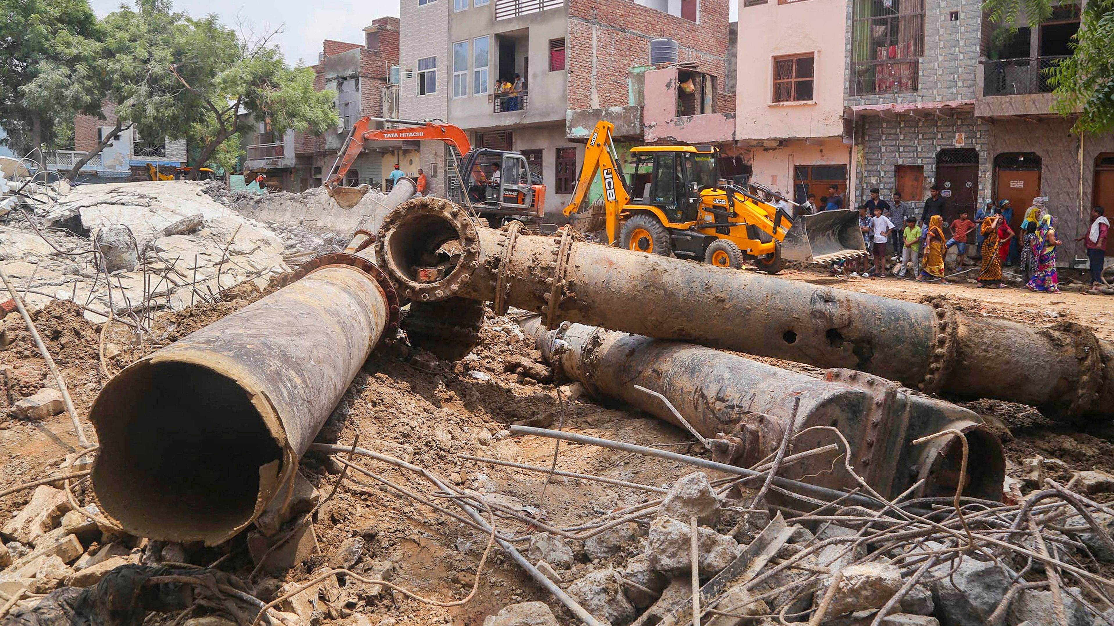 <div class="paragraphs"><p>Debris at the site after an overhead water tank collapsed on June 30 in Mathura on Monday, July 1, 2024. </p></div>