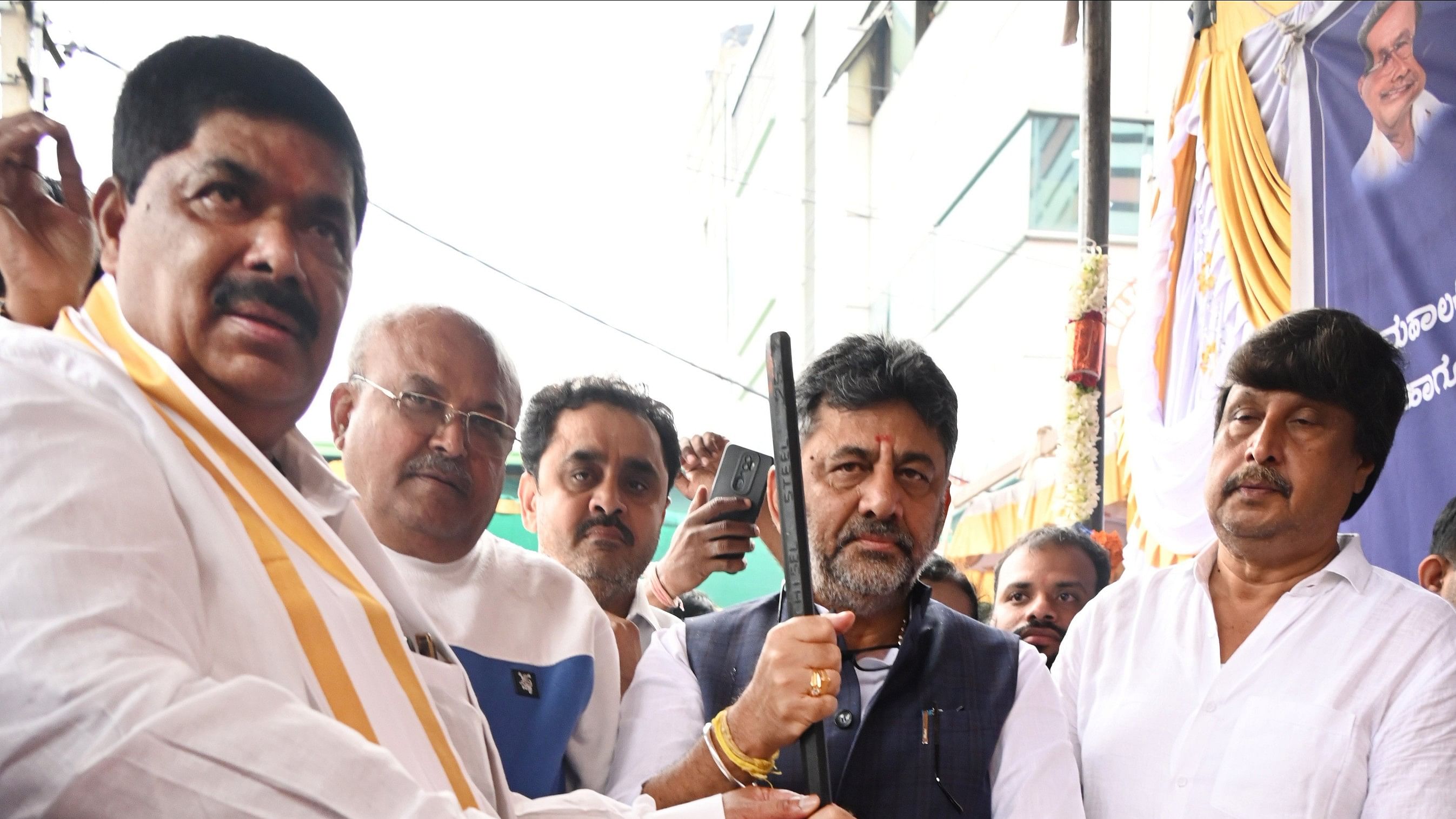 <div class="paragraphs"><p>Deputy Chief Minister DK Shivakumar launches work on white-topping of roads near the Mahalakshmi Layout metro station. Local MLA Gopalaiah was present.</p></div>