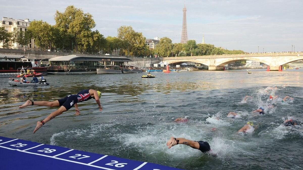 <div class="paragraphs"><p>File photo of&nbsp;athletes competing in the elite men triathlon test event in the River Seine, Paris.</p></div>