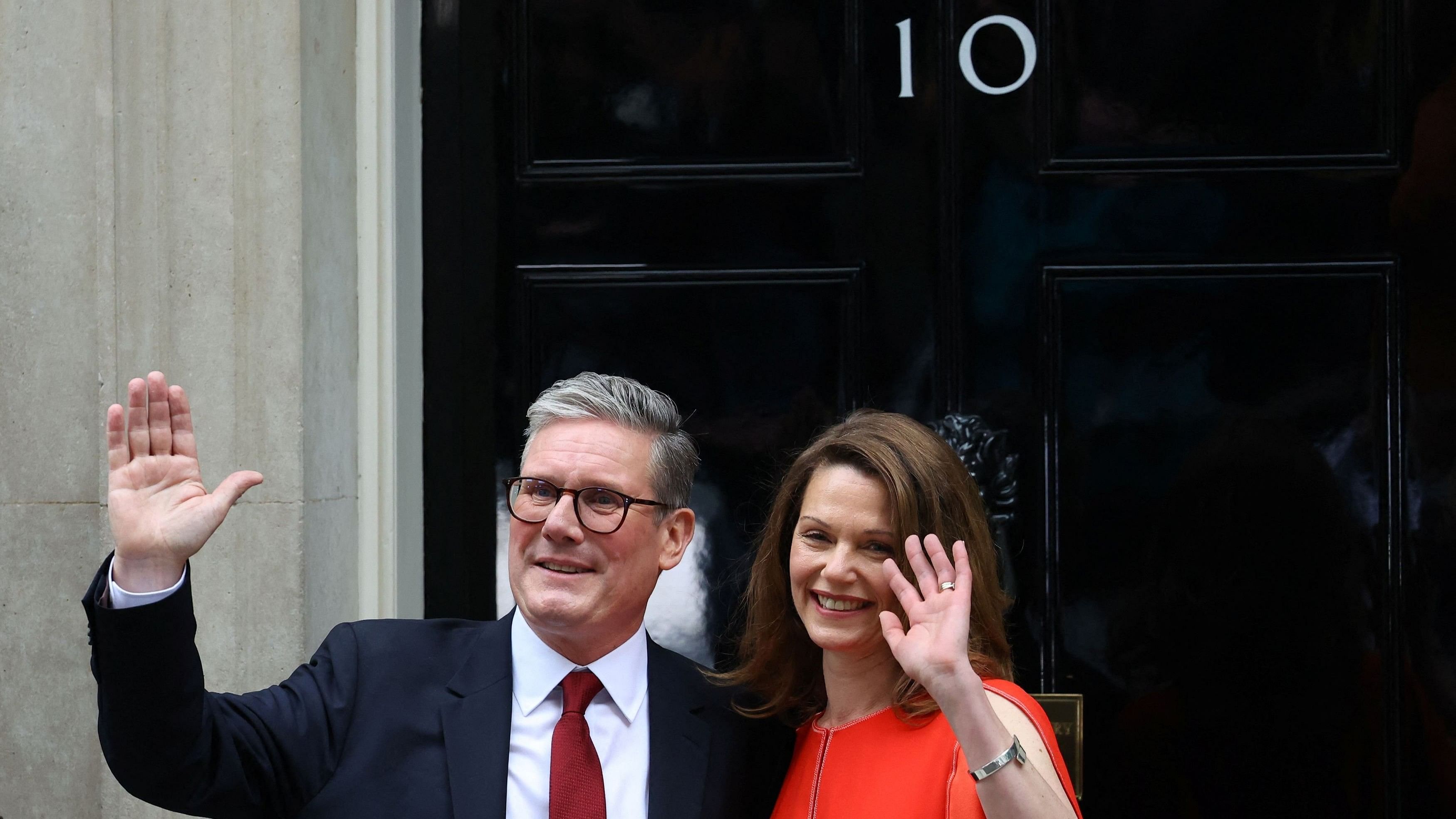 <div class="paragraphs"><p>British Prime Minister Keir Starmer and his wife Victoria Starmer wave outside Downing Street 10, following the results of the election, in London, Britain, July 5, 2024.</p></div>