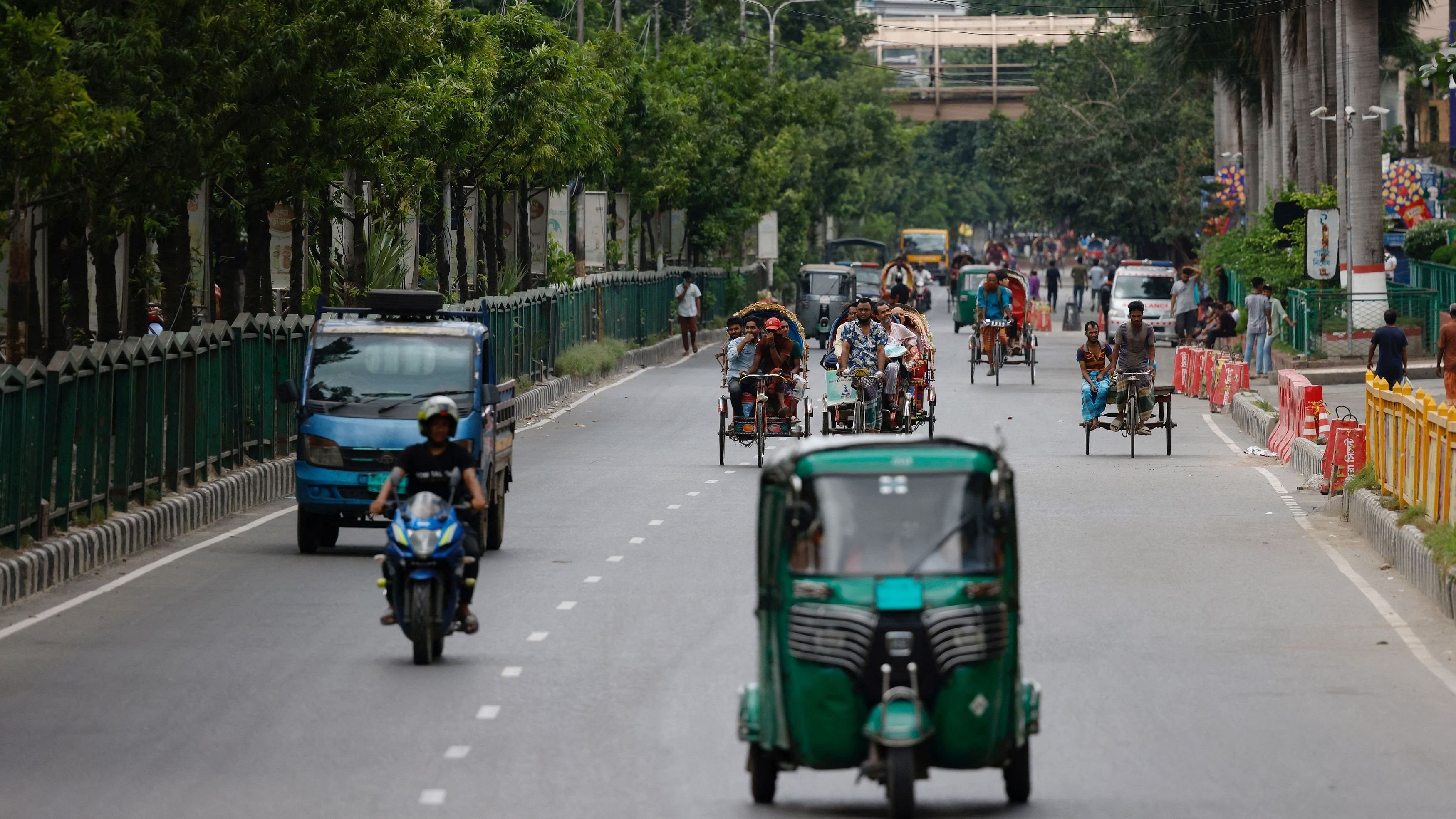 <div class="paragraphs"><p>Limited vehicles move on a street on the second-day of curfew, as violence erupted in parts of the country after protests by students against government job quotas, in Dhaka, Bangladesh, July 21, 2024. </p></div>