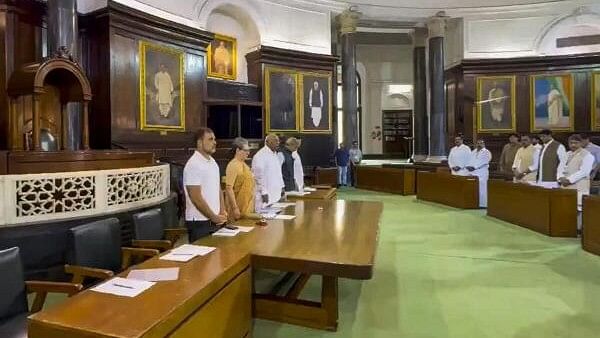 <div class="paragraphs"><p>Congress Parliamentary Party (CPP) Chairperson Sonia Gandhi, LoP Lok Sabha Rahul Gandhi, Congress President Mallikarjun Kharge and other party leaders hold a moment of silence to pay respects to the lives lost in the Wayanad landslide and the three UPSC aspirants in Delhi who succumbed to flooding, during the CPP meeting at the Parliament House, in New Delhi, Wednesday, July 31, 2024.</p></div>