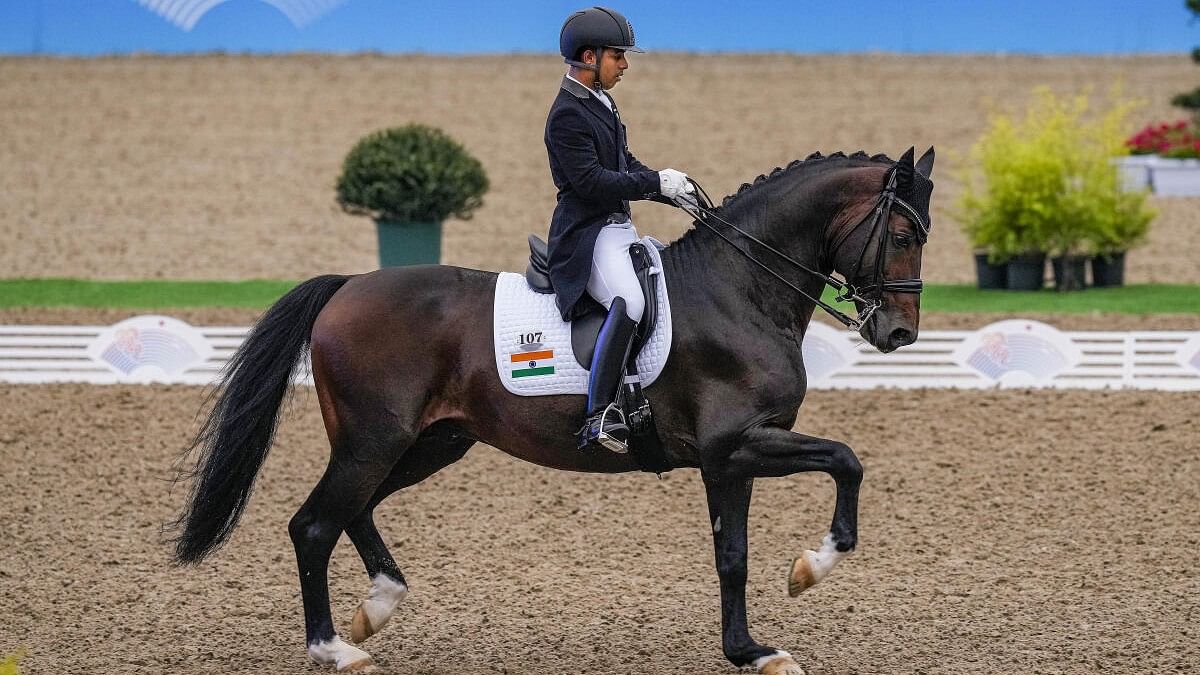 <div class="paragraphs"><p>India’s Anush Agarwalla rides his horse.</p></div>