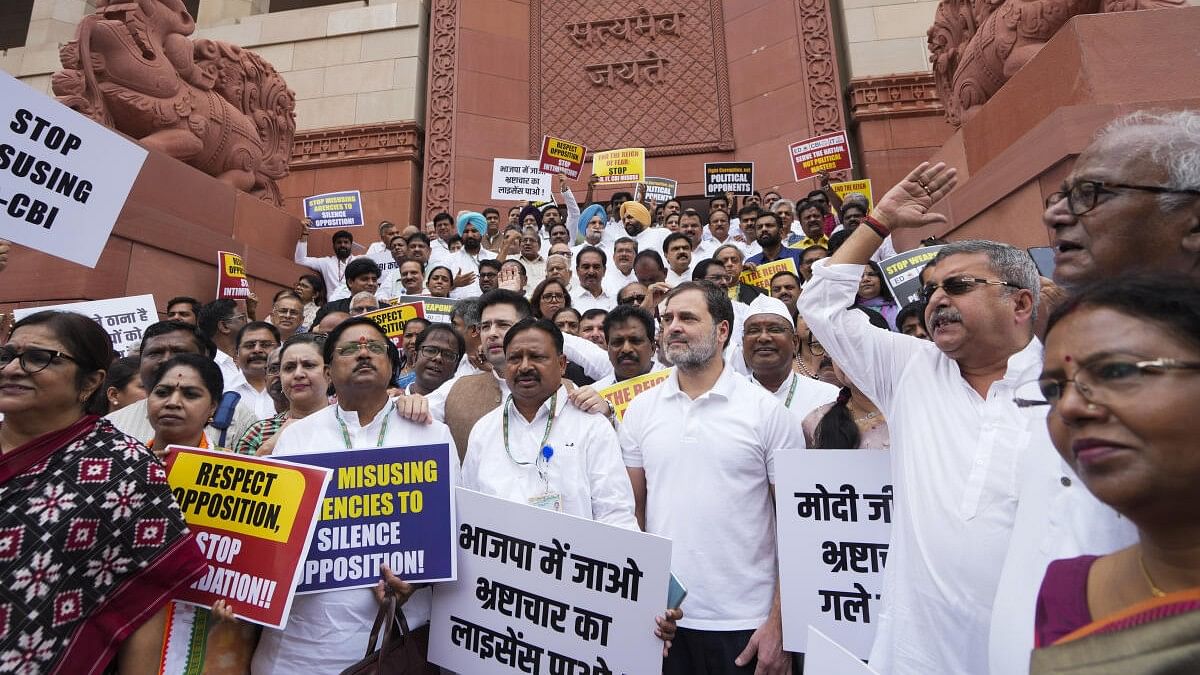 <div class="paragraphs"><p>Leader of Opposition in the Lok Sabha Rahul Gandhi with other MPs of I.N.D.I.A. bloc stages a protest against the alleged misuse of probe agencies by the central government, during ongoing Parliament session.</p></div>
