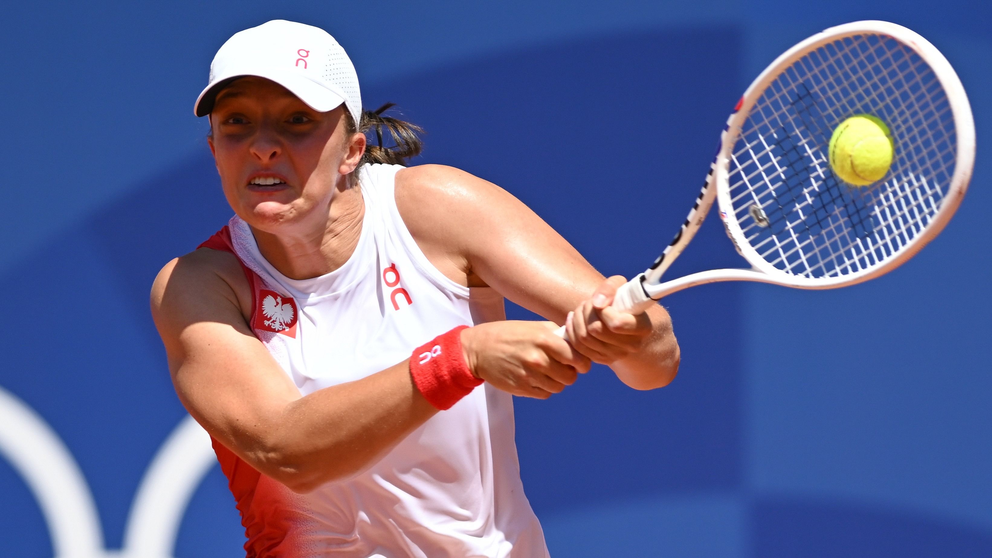 <div class="paragraphs"><p>Iga Swiatek returns during her second-round match win against Diane Parry in the Paris Olympics.</p></div>