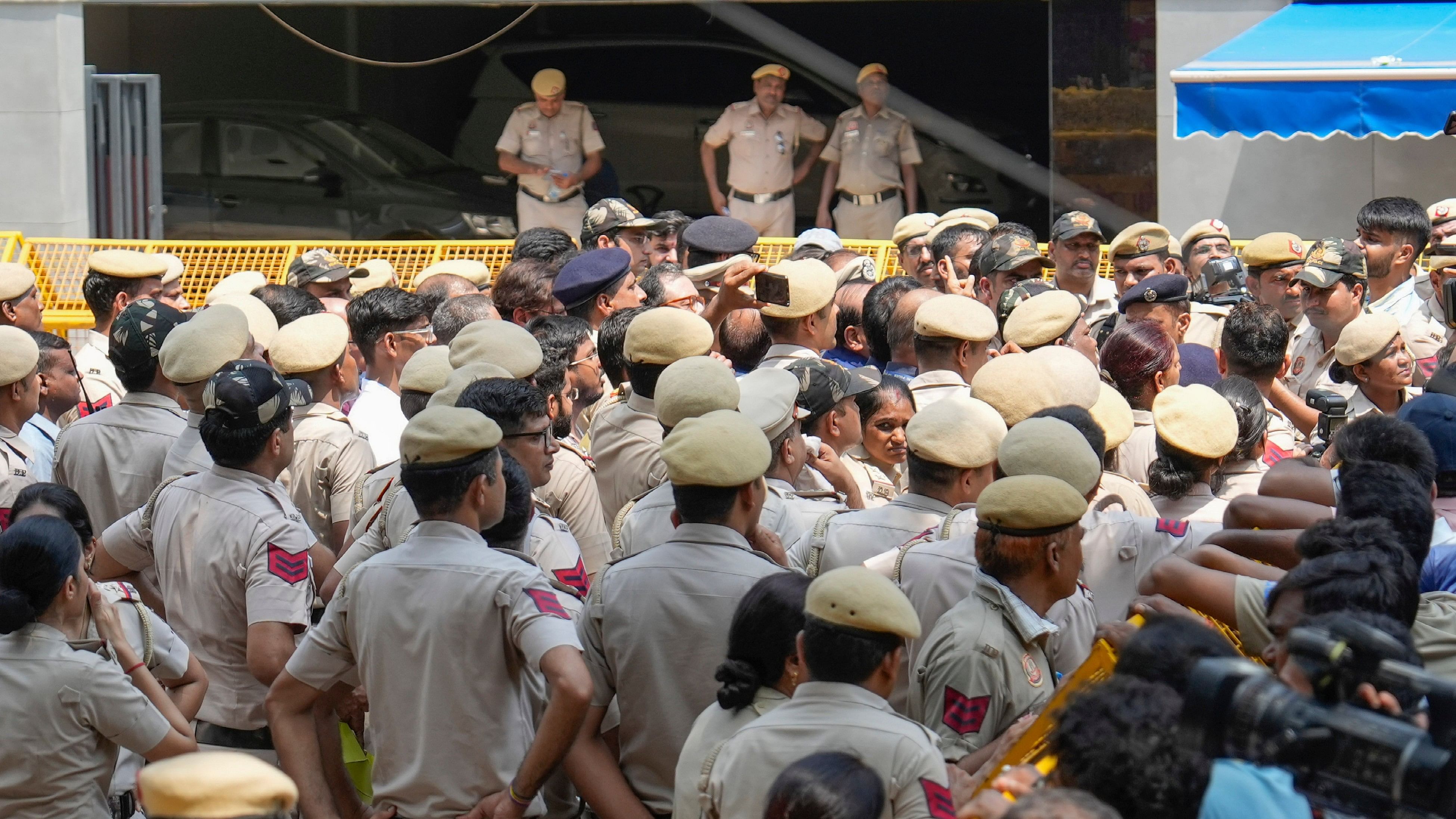 <div class="paragraphs"><p>Police personnel stand guard during an anti-encroachment drive by MCD in Old Rajinder Nagar, after three civil services aspirants died at a coaching centre due to drowning, in New Delhi, Monday, July 29, 2024. </p></div>