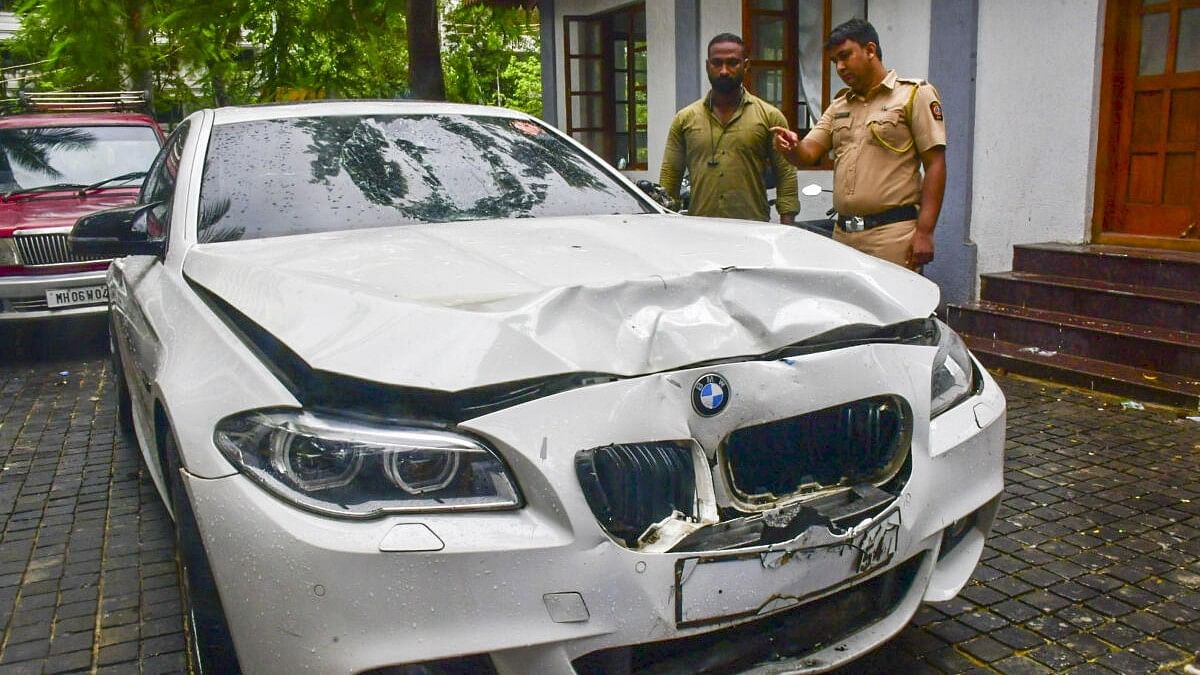 <div class="paragraphs"><p>The damaged BMW car, which was allegedly involved in an accident that killed a woman, parked at Worli Police Station, in Mumbai,</p></div>