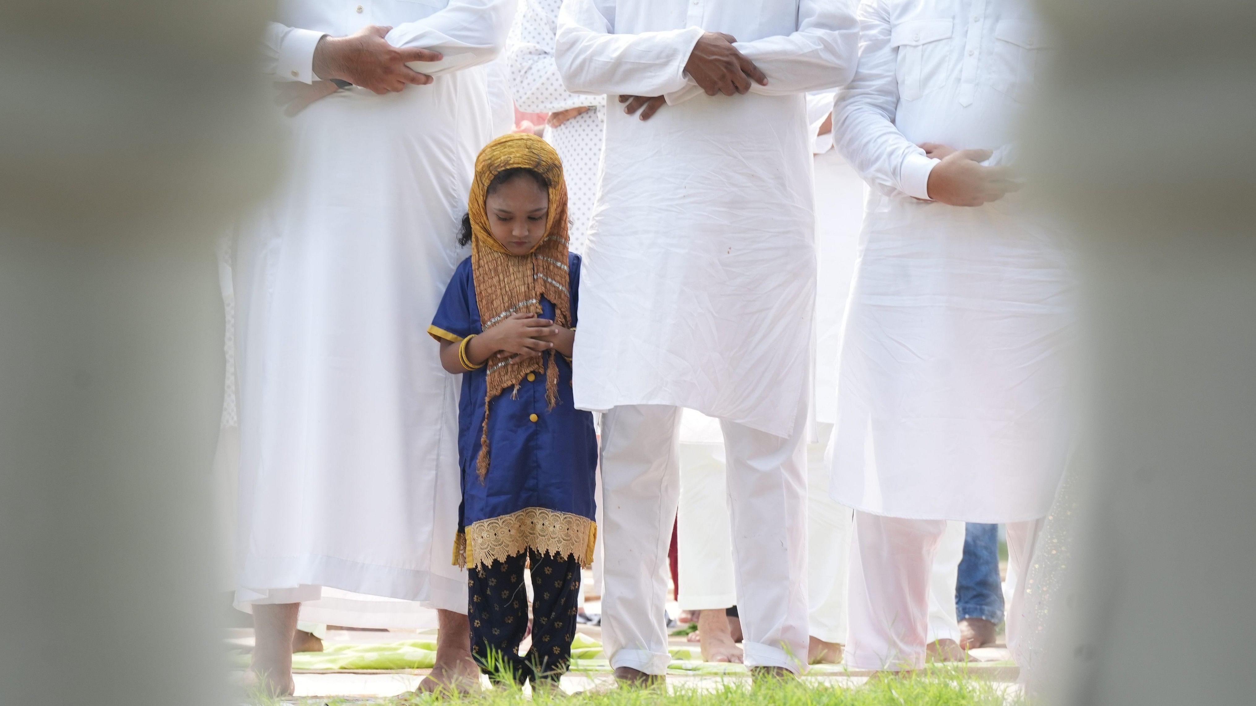 <div class="paragraphs"><p>A girl offers 'namaz' on the Eid al-Adha festival. Representative image</p></div>