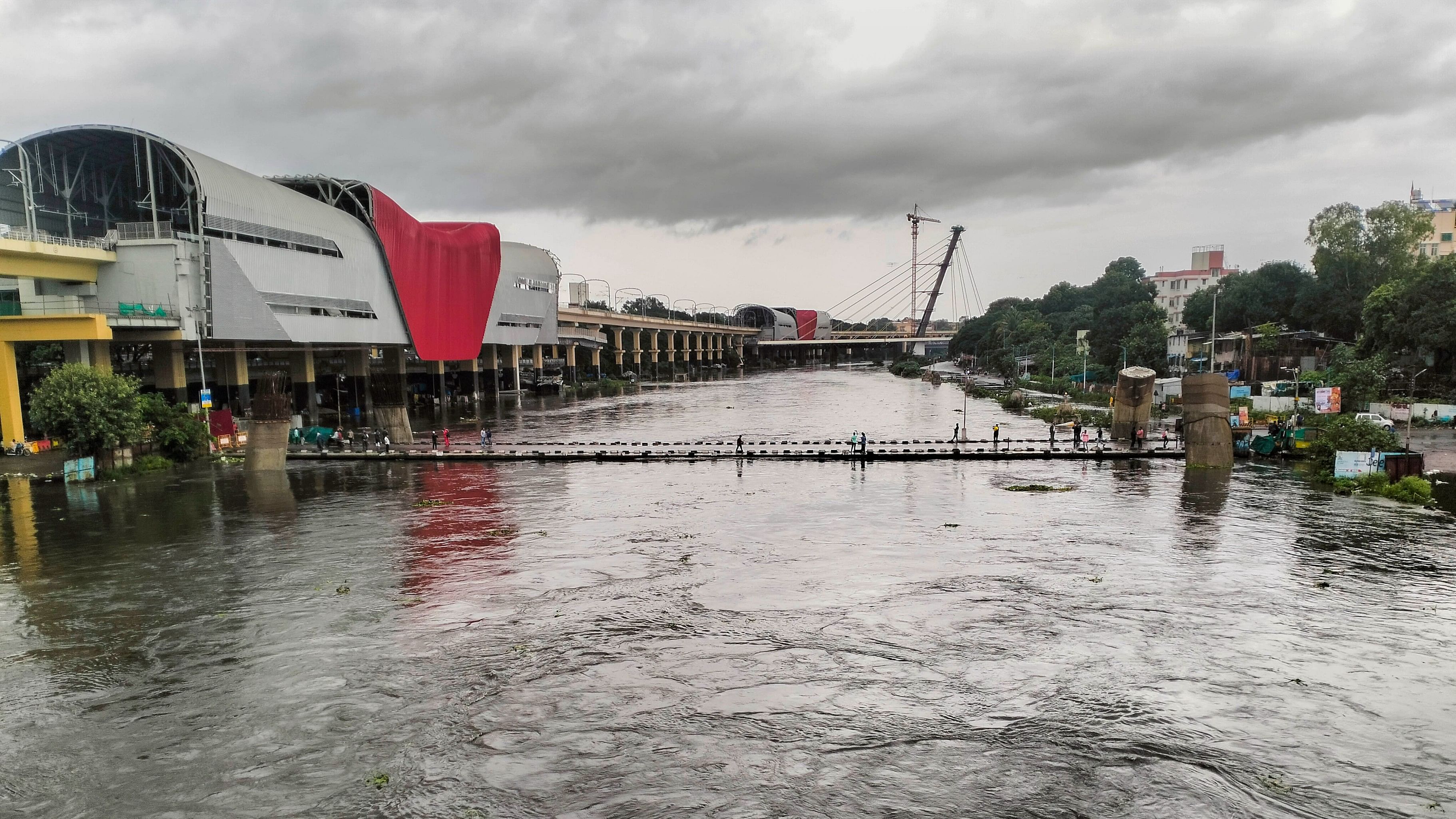 <div class="paragraphs"><p>Mutha River in Pune overflows after heavy rains, in Pune, Wednesday, July 24, 2024.</p></div>