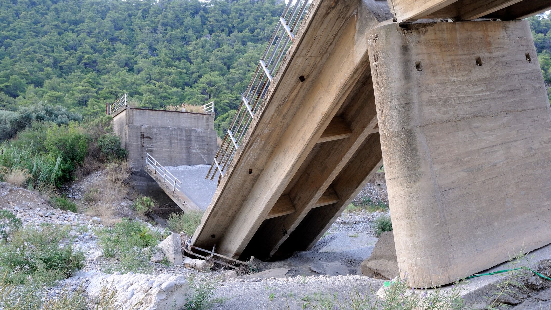 <div class="paragraphs"><p>Representative image showing a collapsed bridge.</p></div>