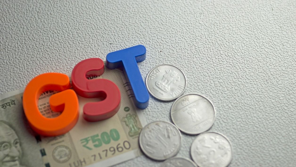 <div class="paragraphs"><p>Representative image showing the words 'GST' and a Rs 500 note.</p></div>