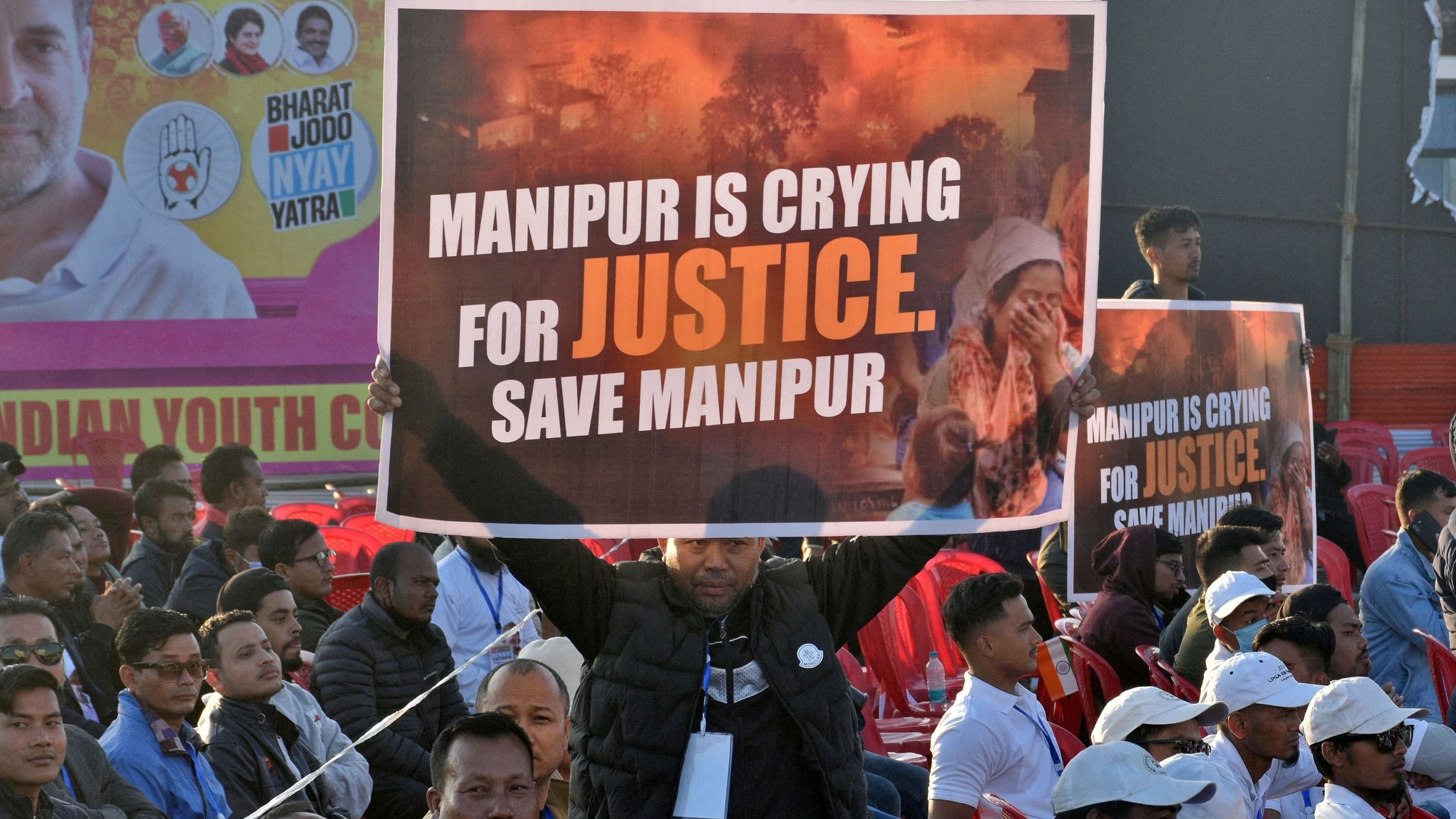 <div class="paragraphs"><p>A supporter of India's main opposition Congress party leader Rahul Gandhi in Thoubal district of the northeastern state of Manipur, India on January 14, 2024. </p></div>