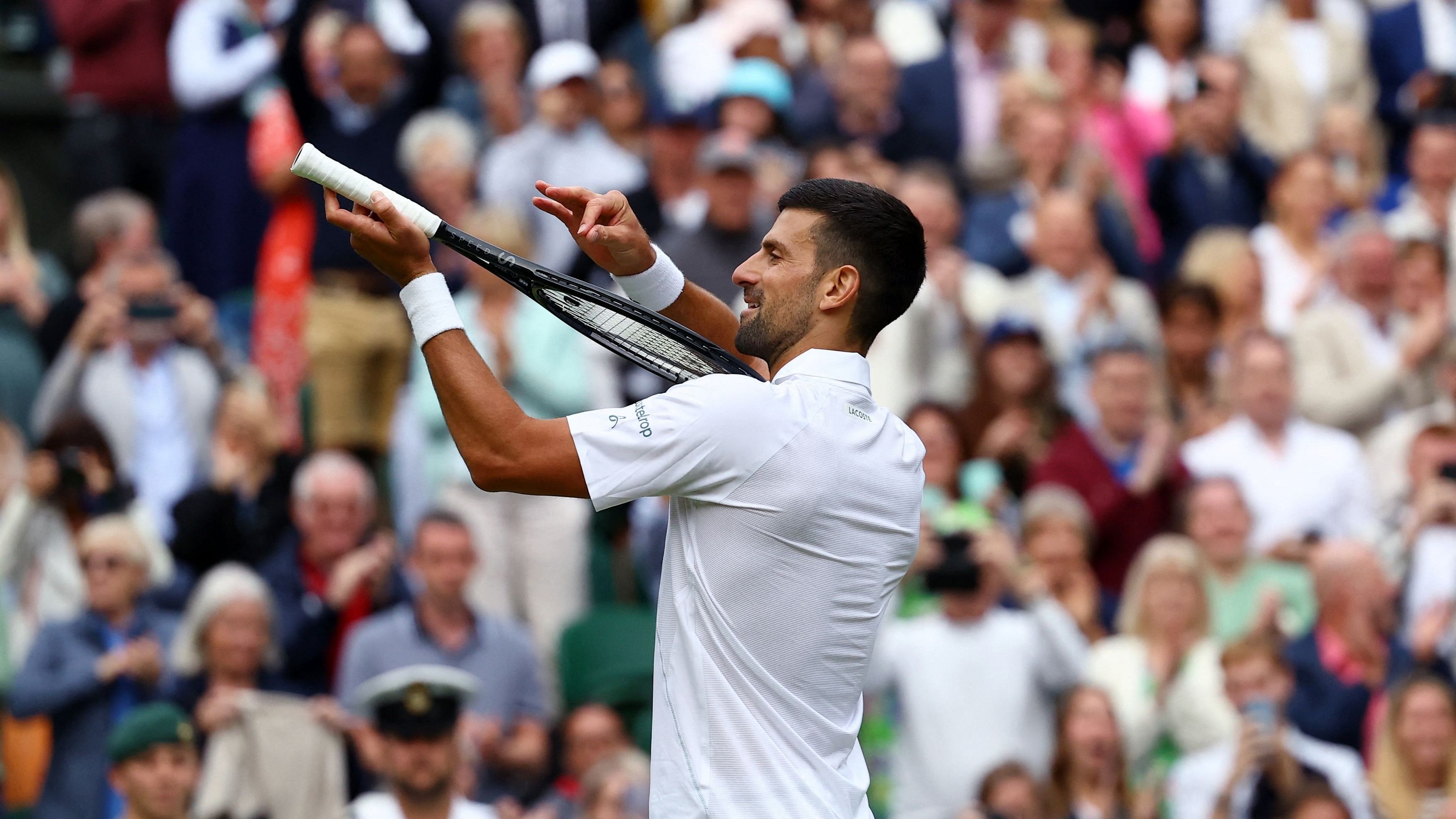 <div class="paragraphs"><p>Serbia's Novak Djokovic celebrates after winning his semi final match against Italy's Lorenzo Musetti.</p></div>