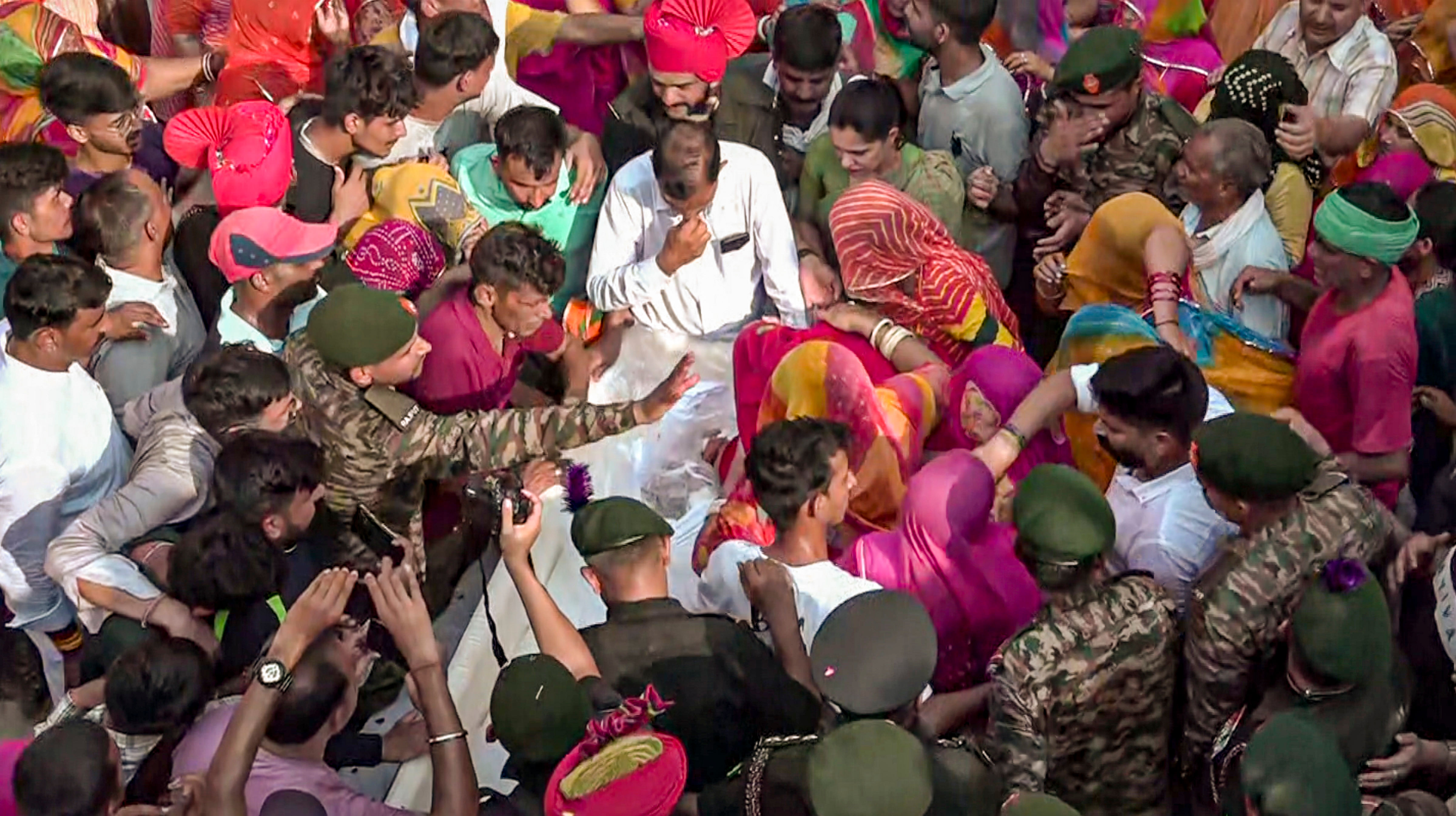 <div class="paragraphs"><p> Family members mourn as the mortal remains of martyred Sepoy Bijendra Singh who was killed in a recent terrorist encounter in Jammu and Kashmir's Doda district, arrive at his home town, in Jhunjhunu, Rajasthan, Wednesday, July 17, 2024. </p></div>