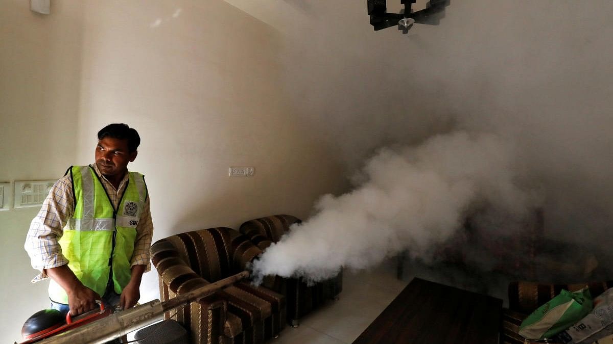 <div class="paragraphs"><p>A public health department worker fumigates inside a house to prevent the spread of mosquito-borne diseases in New Delhi, India.</p></div>